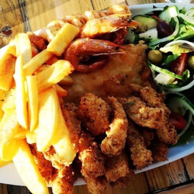 Seafood platter with salad and fries